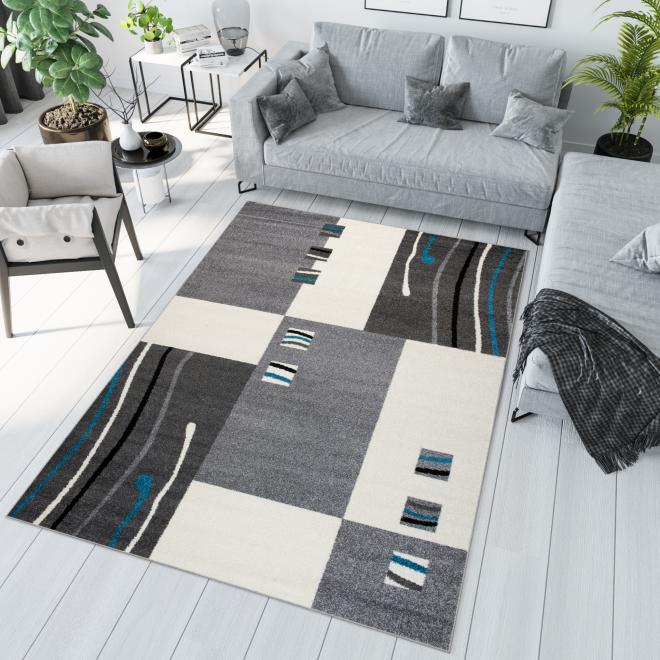 Moderní šedý koberec se vzorem