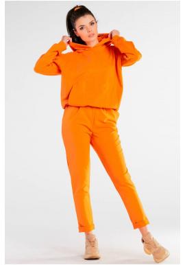 Pohodlné dámské tepláky oranžové barvy