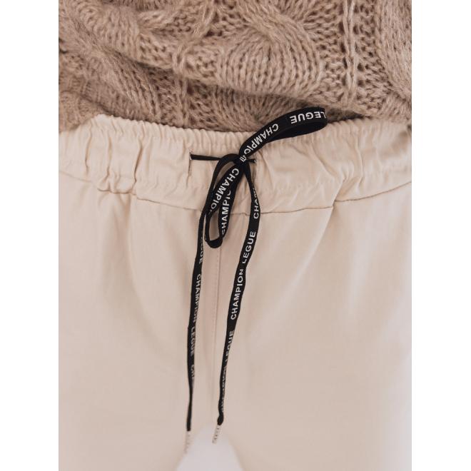 Stylové dámské kalhoty béžové barvy s vázáním v pase