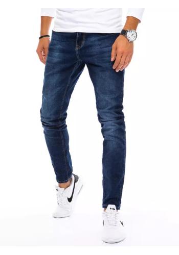 Klasické pánské džíny tmavě modré barvy se zúženými kalhotami