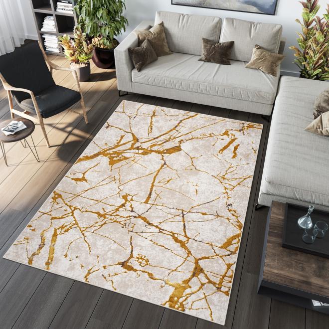 Moderní béžový koberec se zlatým vzorem