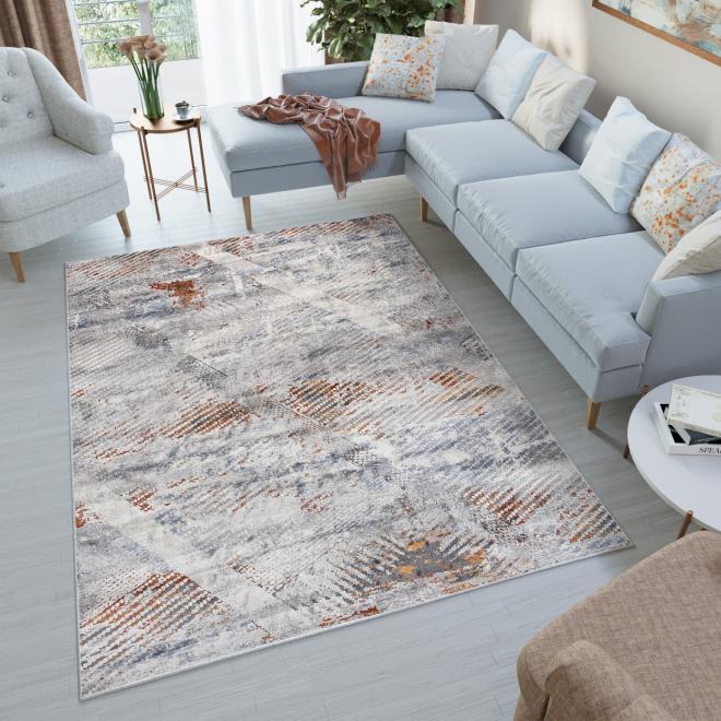 Šedý koberec s moderním vzorem