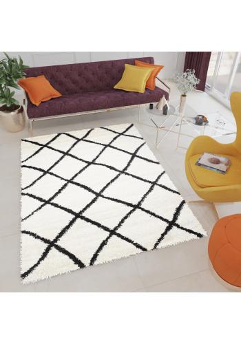 Vzorovaný shaggy koberec krémové barvy