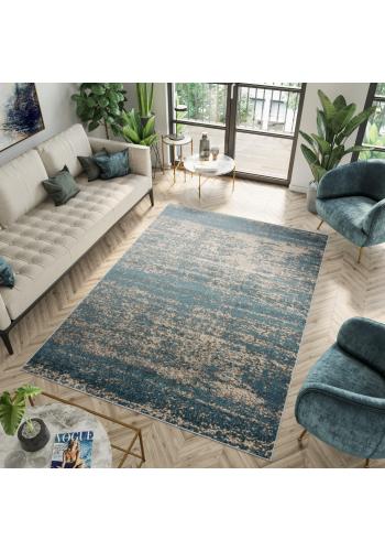 Tyrkysový koberec s jemným vzorem
