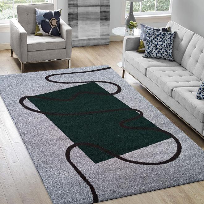 Zelený koberec s moderním vzorem
