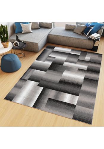 Vzorovaný koberec v šedé barvě